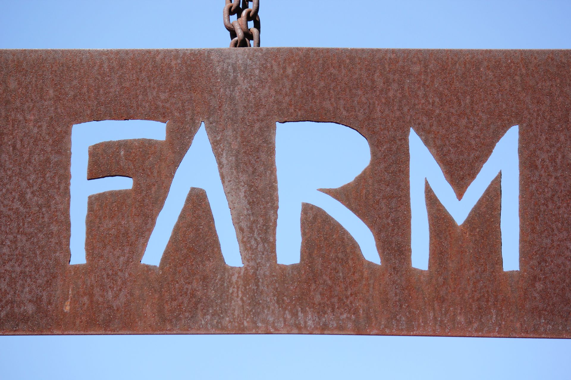 Sign with bold cut-out lettering
